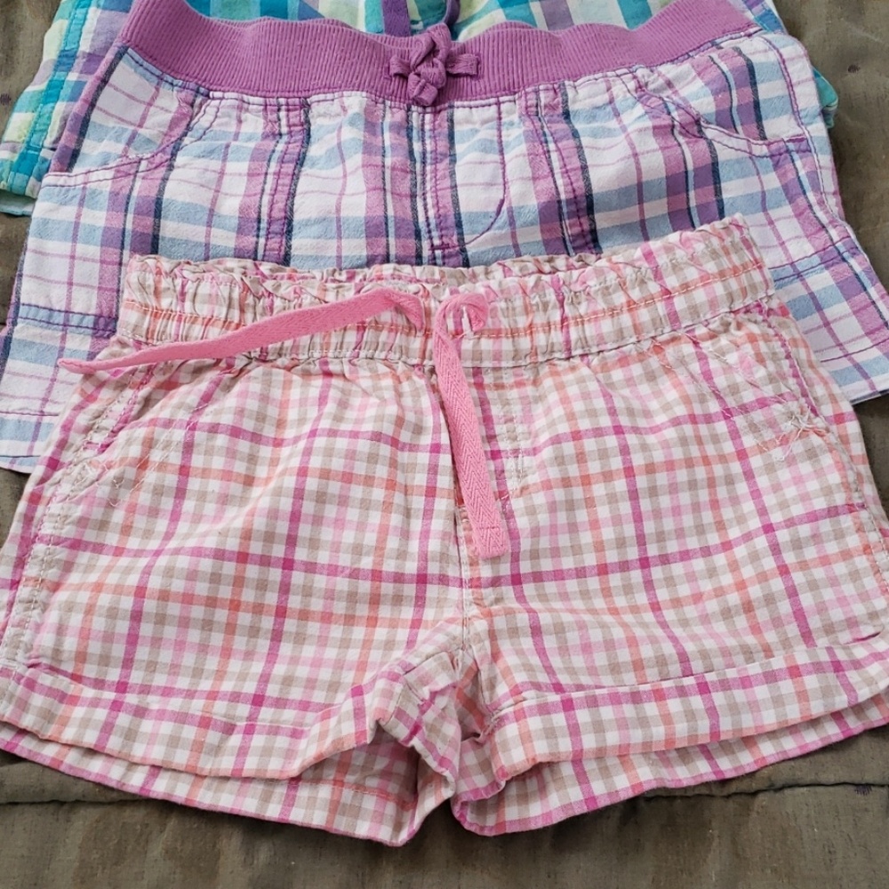 Size 7/8 three pairs of shorts